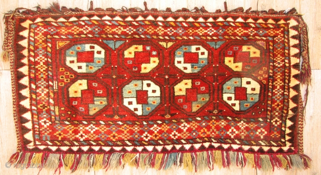  Central Asian Arab Bag, Wool pile weaving, Late 19th/Early 20th century, 27" x 51" 

This is in excellent condition and clean.  What looks like a stain on the top right  ...