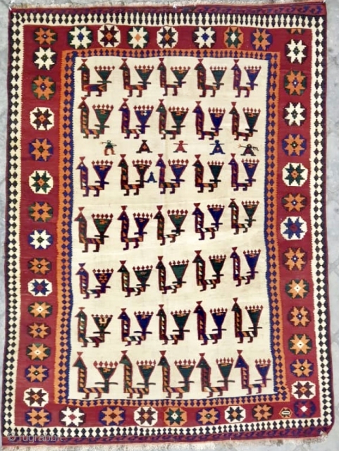 Very unusual antique qashqai kelim with birds alover and some people ca 1920 s size 233 x 166 cm
One old repair            