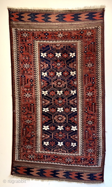 here is a fabulous early baluch rug from the mid 19 c.  Mina khani ( thousand flowers) design. Unusual early palette lovely chevron kelim end finishes large old tent carpet size  ...