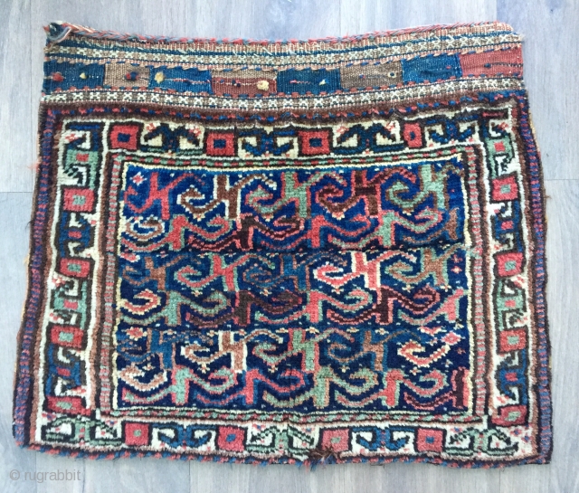 Unusual antique bagface probably made by Kurds of the veramin area  All natural dyes handspun undyed Ivory warps with various shades of red and brown (dyed and undyed) handspun wool wefts.  ...