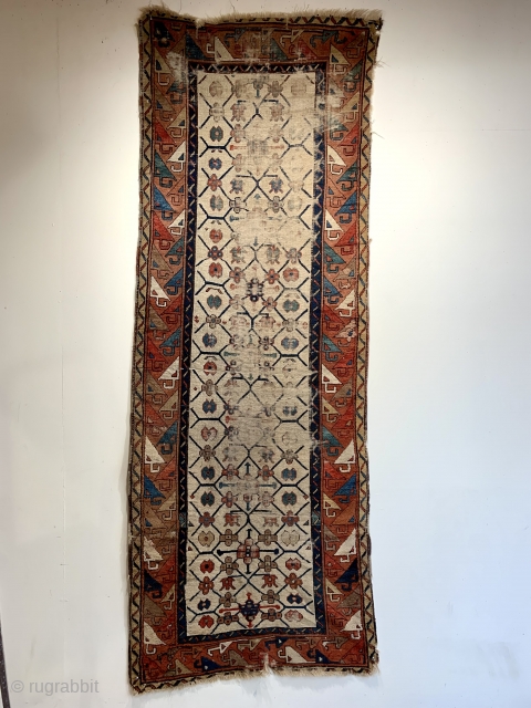 here is an early 19 c runner probably eastern Kurdistan size 273 x 99 cm.  Very rare piece could be restored           