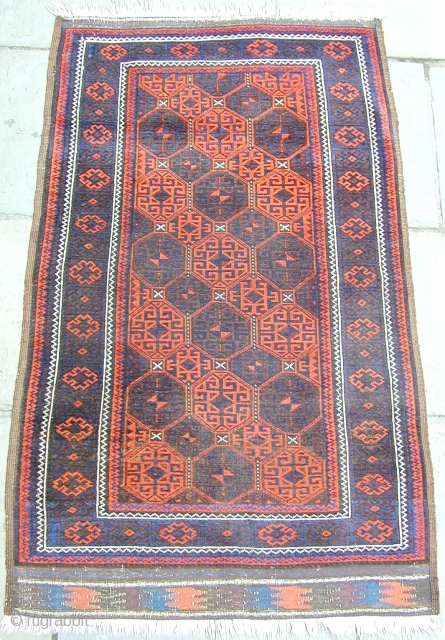 Superior Baluch rug ca 1880 size 65" by 38".
All wool and natural dyes . Fine and thin with original selvedges and kelim ends. No repair very evenly worn not showing hardly any  ...