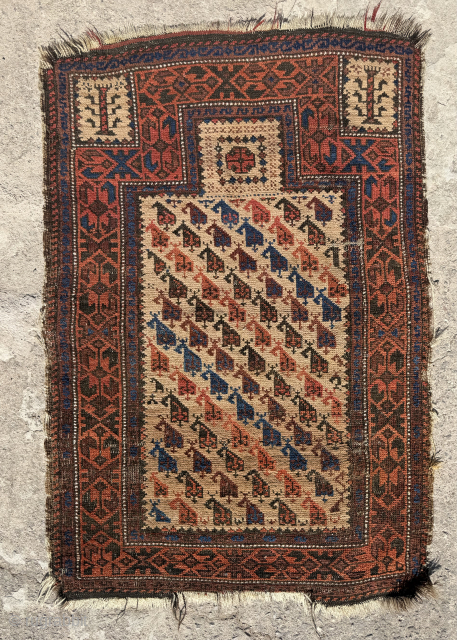  lovely little Baluch prayer rug ca 1880 size 116 x 74 cm.  On a  camel hair ground, interestingly it is woven upside down as Turkish prayer rugs  are  ...