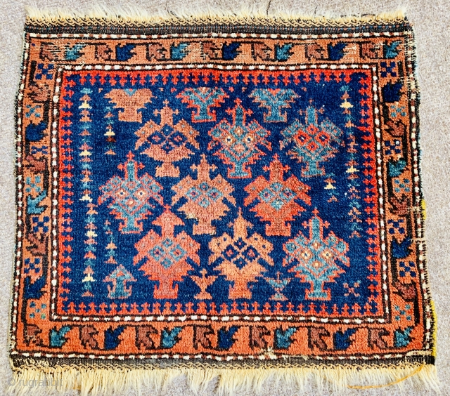 
Super antique Timuri Baluch bag ca 1880 great wool glowing natural dyes wear to top border and few old moth holes 
63 x 56 cm        