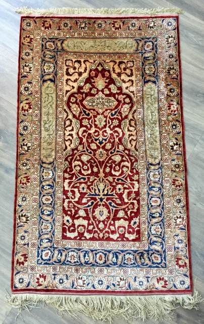 A beautiful all silk and metal thread inscribed and signed Hereke prayer rug ca 1930 in perfect condition soft and floppy no cracking.  Hanging strip to rear and painted Dutch import  ...