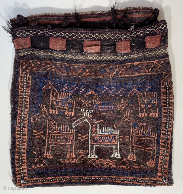 Very unusual antique Baluch animal bag with horses not the usual birds.  Ca 1900 size 67 x 53 cm original back just hand washed good condition the red has tip faded  ...