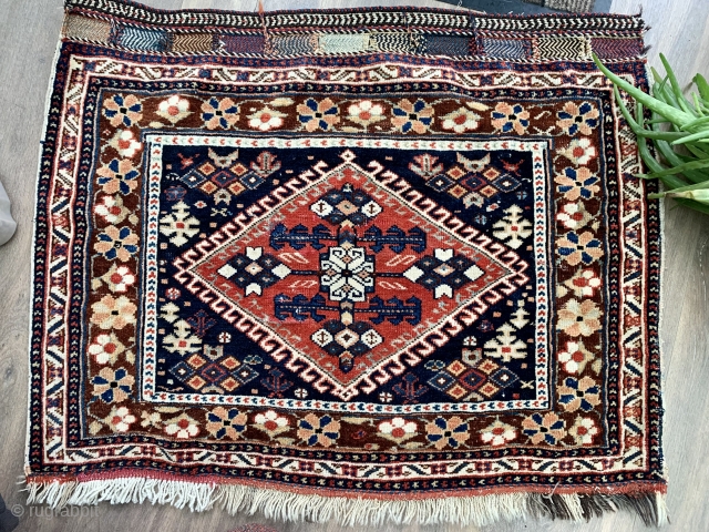 Very unusual Afshar bagface ca 1900.   Natural dyes wool warp cotton weft good condition one small repair to kelim finish at bottom.   Size 85 x 69 cm  