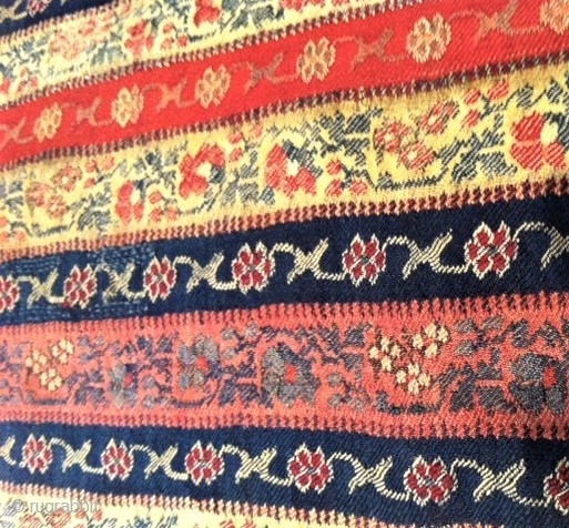 Termeh Iran
very old (about 1900 or earlyer), also very fine quality in wool, with beautiful coulours.

Of Course there are some wholes and some of them are stuffed (like on the Foto), but  ...