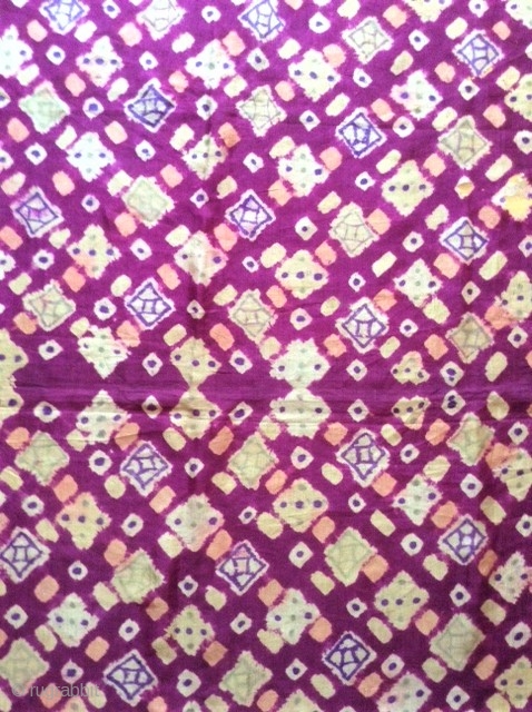 Ceremonial plangi from Bali, very fine silk fabric with beautiful coloures in red/violet and yellow /orange.
It is a part of a festival dress for woman, about 20th centery.
The thin fabric knows some  ...