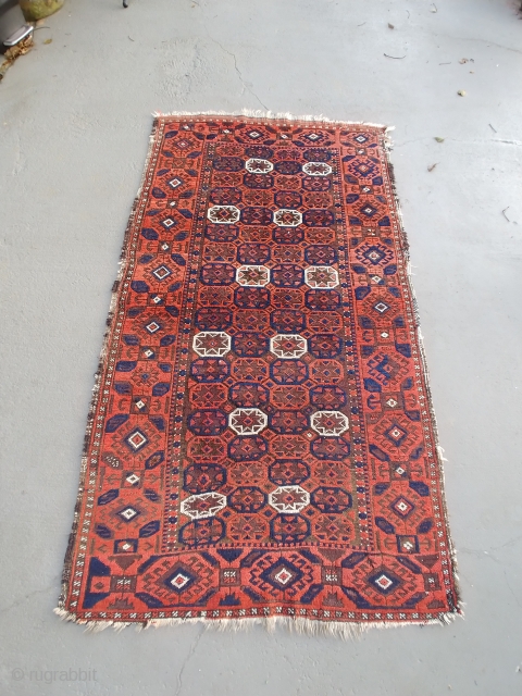An unusual antique Baluch. All you need is a horse to wrap up the sides and its ready to ride. It measures 36 x 63 inches and is symmetrically knotted. Looking at  ...