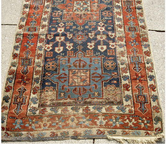 Early NW. Persian runner. Could use a cleaning and repair but well worth it. It measures approximately 13.5feet x 3feet.             