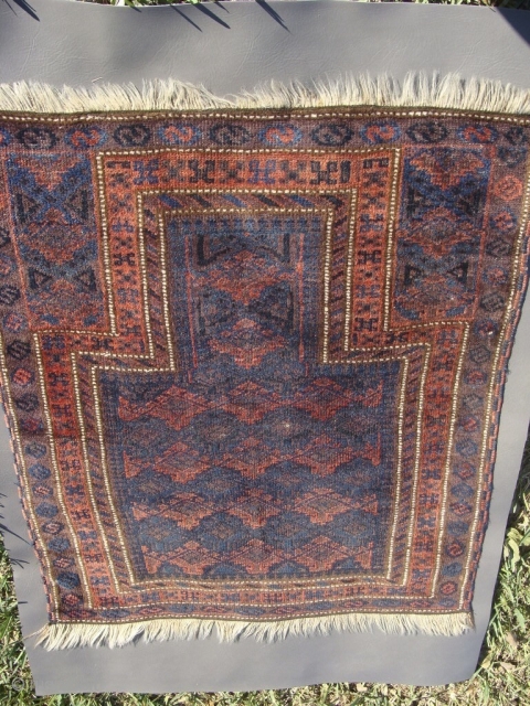 almost Square 3ft x 3ft Baluch Prayer rug. Measures close to 35inches by 40.6inches without fringe or 88.9cm by 101.6cm.             