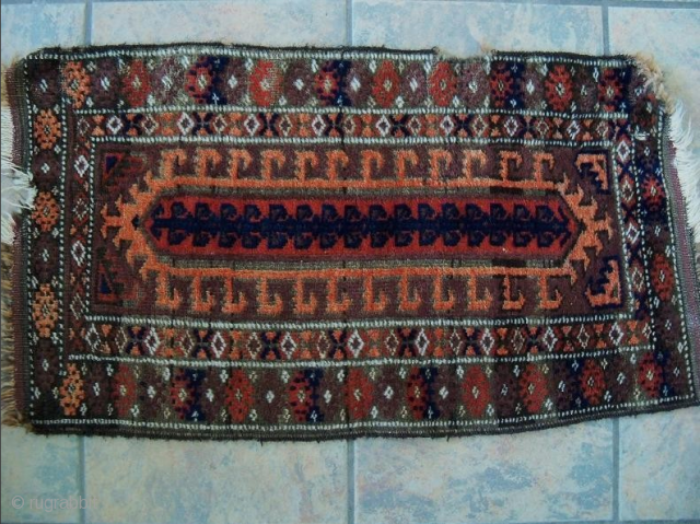 Baluch Balisht with an unusual field design mostly found on larger rugs. 
32inches x 18inches                  