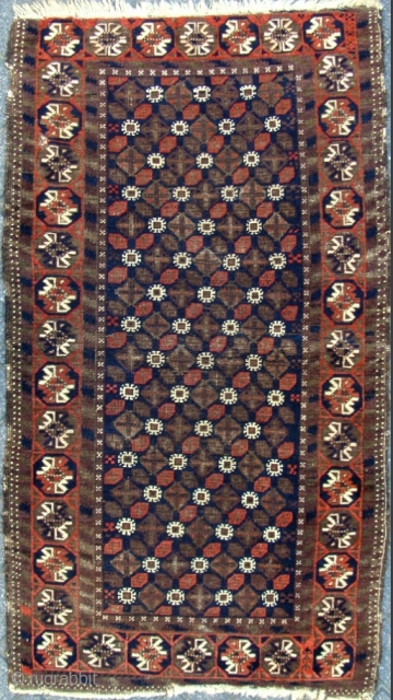 An old Baluch with a border design I do not recall ever seeing before. 31 x 55 inches. I would love any feedback.          