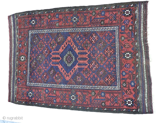 A Rare and Cute Antique Miniature of a Baluch Main Carpet. Measures 40inches x 58inches/101.6 cm x 147.3 cm including Kelim ends. Great border and with great aubergine. It is the smallest  ...