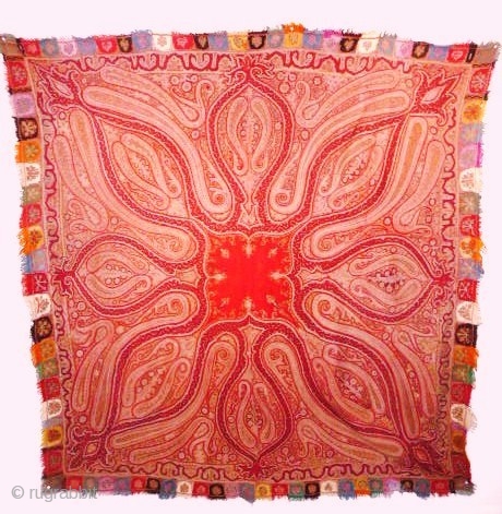 A sumptious shawl from Kashmir ,mid 19th cent.,beautiful colours, exquisite workmanship,good condition with no holes or repairs, approx. 1m80 squareSOLD             