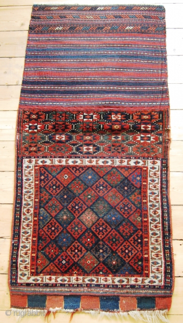 A 19/20th Century Jaff Kurd Khorjin with Brocaded Striped Kilim Back 
 
Size; Face:70 x 68 cm Overall (including flat woven ties): 147 x 68cm

Well drawn with good colours and unusually the  ...