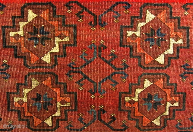 A late 19th century Ersari  Rug 

Size 145 x 78 cm

An Ersari small rug with chuval guls, simplified dyrnak secondary motif and lively shudur main border. Overall even flat wear with  ...