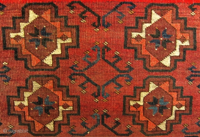 A late 19th century Ersari  Rug 

Size 145 x 78 cm

An Ersari small rug with chuval guls, simplified dyrnak secondary motif and lively shudur main border. Overall even flat wear with  ...