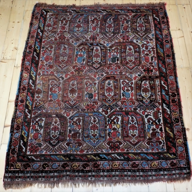 A late 19th Century Khamseh Rug
Size 186 x 148 cm
A naïvely drawn and colourful Boteh rug in good original condition, evenly worn with great colours and soft handle. Original selvedges and kilim  ...