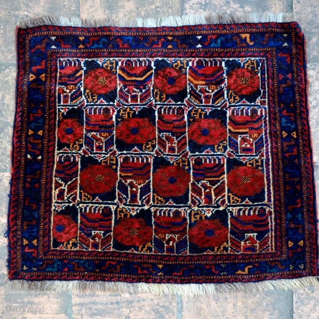 A Khamseh Khorjin/Bagface 

Size 70 x 61.5 cm

An unusual compartmentalised Khamseh bagface with full pile and all natural colours, (kilim ends have been removed). The motifs are highly abstracted and suggest roses(pomegranates?)  ...