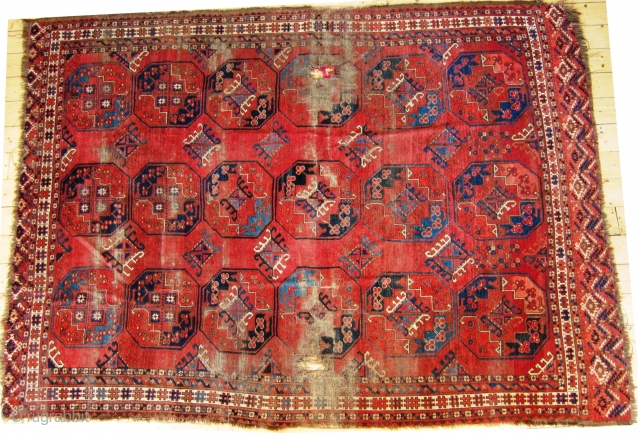 Mid 19th Century Ersari main carpet, damaged but beautiful, with a rare quartered gull design  and unusual dyrnak secondary guls, pile is mostly full at both ends though there are two  ...