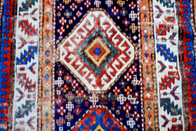  A 19th Century South Caucasian/Northwest Persian Long Rug
 Size 299 x 108 cm

A transitional Caucasian/Northwest Persian long rug with very good colours and with original knotted fringes at one end, original  ...
