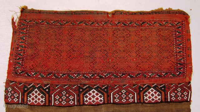 A Turkman brocaded Torba,possibly Yomut, probably late 19th century.
Size; main panel       122 x 48cm
      secondary panel  122 x 14cm
   ...