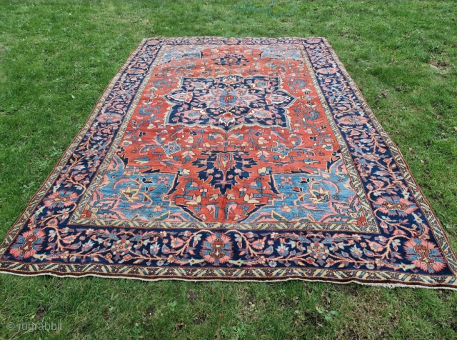 ACarpet from the Heris Region of North Estren Iran ,EstAzerbijan.Woven between 1910/1920 AD.the Carpet is in excellent condition colors are derived from nature .the Heris pattern featnes a Royal blue medallion Wiht  ...