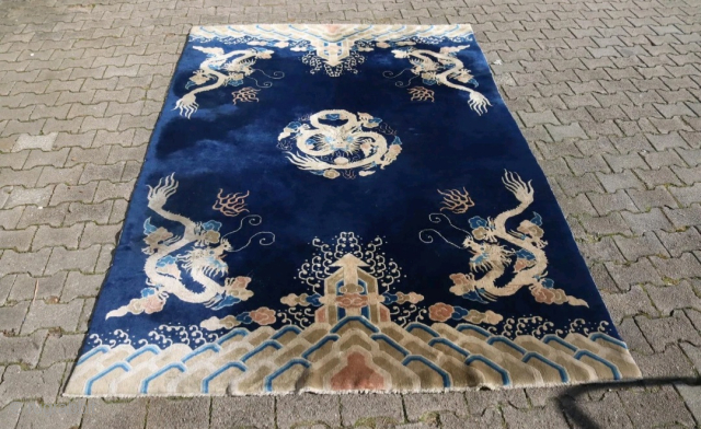 Beautiful Peking rug with dragons, size 6'3" x 9'2".                        