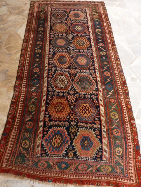 Kurdish rug, mid 19th century. 293 x 134 cm.                        
