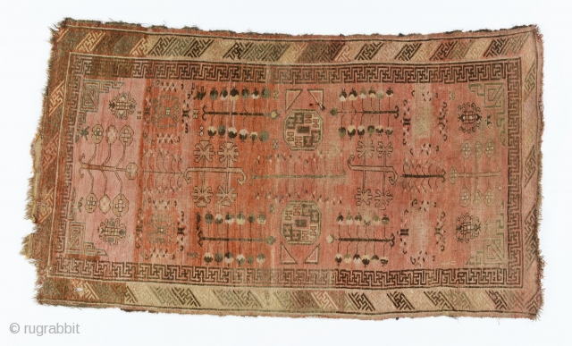 A Kyrgyz giliam, Chinese Turkestan, probably Aksu area, late 19th century, 270 by 147 cm, classical Kashgar design with elements borrowed from Turkoman rugs, a small figurines of a man, horse, camel  ...