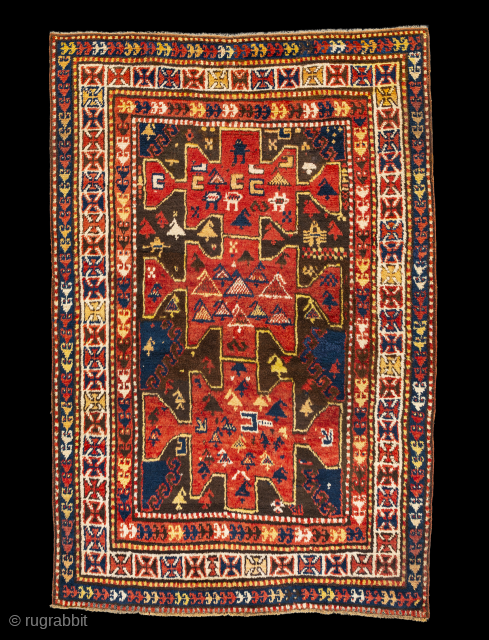 Unique Karachov rug circa 1900 with figures that look like aliens, pacmans and spaceships! An outer cross pattée border. Full pile in perfect condition. Original condition with no repiles or repairs. 4'4"  ...