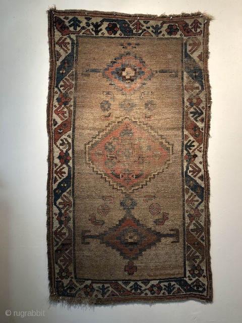 An early N.W. Persian, Kurdish small rug  3'4" X 5'8"  Ca.1800  An amazingly graphic design, beautiful early drawing of all the different designs in the rug. Folks familiar with  ...