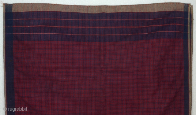 Shoulder or hip cloth, cotton, Benkulu, Sumatra, Indonesia, ca. 1950

Traditionally designed rectangular cotton cloth, handwoven, red, dark and light blue squared stripes of various combinations, monochrom blu and off white border, finely  ...