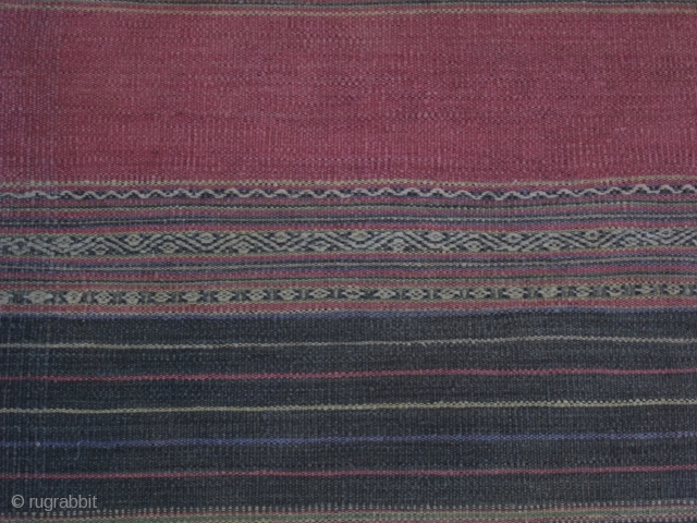 Blanket, cotton, Ede people/ Central Vietnam, ca. 1950

Traditional handwoven rectangular cloth, two panels, handspun cotton, indigo blue, brownish red, off white, metall thread, supposedly natural dyes, variations of stripes with suppelementary weft  ...