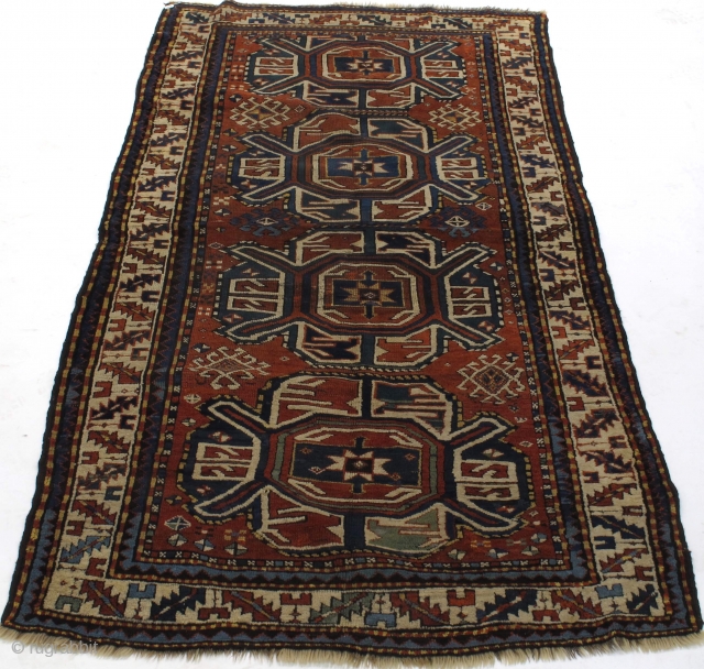 Kazak 240x125 cm circa 1900. Condition: fair, even low pile. Wool warp, wool weft, wool pile

Worldwide shipping
                