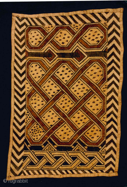 A wonderful cubistic raffia shoowa. Perfect condition.                          