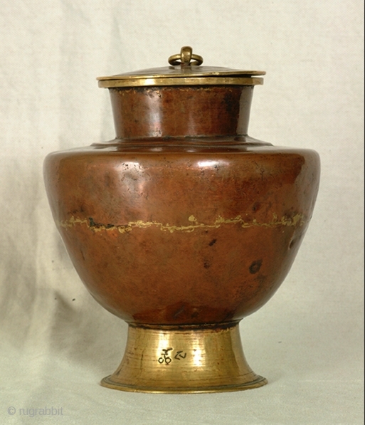 Tibetan Vase. Copper and brass. Second half of 19th cent. or beginning of 20th. The writing says 'Chort' 'Offering'              