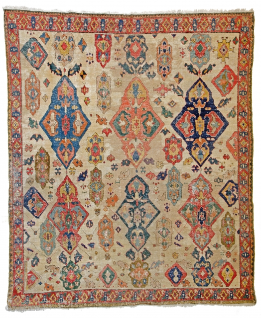 Lot #169, Azerbaidjan carpet,
8ft. 6in. x 7ft. (260 x 213 cm),
Azerbaidjan 18th century,
Condition: fair, even low pile, some staining to field,
original ends and selvedge, few small spots of old repair,
cotton warp, cotton  ...