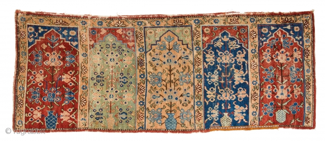 Lot #192, Khotan saf,
9ft. x 3ft. 7in. (275 x 110 cm),
East Turkestan circa 1800,
Condition: good, some areas of wear, six inch repair in lower minor border, original end finish and selvedges. Wool  ...
