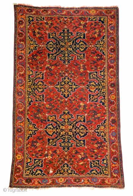 Lot 154, Star Ushak, 10ft. 1in. x 6ft. 1in., Turkey circa 1600, condition: very good, some areas of low pile, few small old repairs, few small holes, corroded brown, wool warp, wool  ...