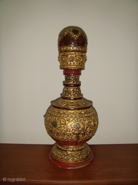 An extremely rare, well preserved, Mid19thCentury Lacquered Gold-gilt Water Vessel with Cup Cover. 
Used in Royal Households during the Konbaung Dynasty (c.1752-1887)/ Mandalay Period.
Approx. Dimensions: Height:17in (44cm) Circumference:22in (56cm).
Materials used: Woven Bamboo;  ...