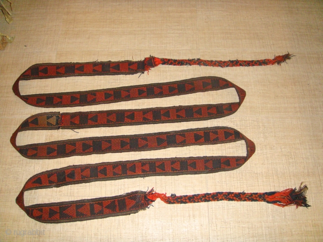 Early 20th Century, Wool Turkmen Malband. Colour: Orange and Black (similar to Baluch types).
Strap Length (without Rope Straps): Approx. 481cm ; Strap Width: Approx. 07cm.
Rope Fasteners Length: 60cm and 61cm for Both  ...