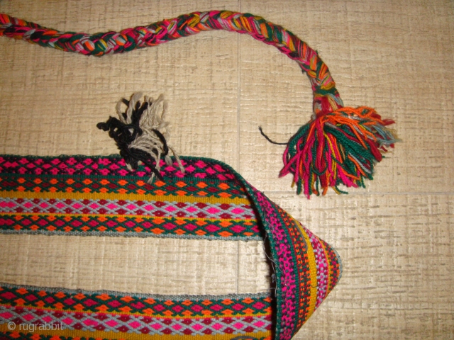 Early 20th Century, Rare Multi-coloured, Shahsavan Malband (Wool). Full piece and in Excellent condition. Strap Length (without the Tasseled Rope fasteners): Approx. 227cm; Strap Width: Approx. 07cm. Tasseled Rope Fasteners' Lengths at  ...