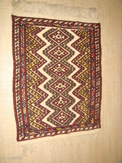 Rare, mid-20th Century Turkmen "Doruye", Double-sided Pile-embossed Flatweave. Design features stylized multi-pointed "Star" motif with "evil-eye" center. This symbol is usually associated with preventing ill-luck. The overall "Zig-Zag" pattern depicts "Flowing Water".  ...