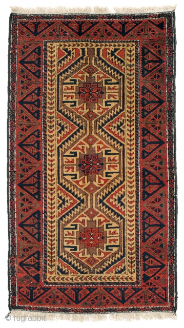 This antique Baluch Khorasan rug in a camel field has a design bar of three hexagons, each enclosing a serrated star (Turkmen ashyk motif) and arrows around an eternal knot motif. The  ...