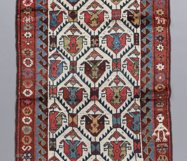 An early Kurdish runner.  All original and in great condition. Gorgeous wool and colors. 10'1" x 3'3". 

Please view this and many more collectible pieces on our website at:
https://www.bbolour.com/all-tribal-and-village-rugs/   