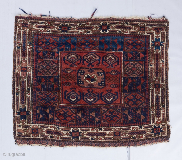 Baluch salor gol bagface. The faded brownish, purplish, grayish color is either fuchsine or logwood dye. Ask for more details. 

Visit our website for more rare woven art : www.bbolour.com   