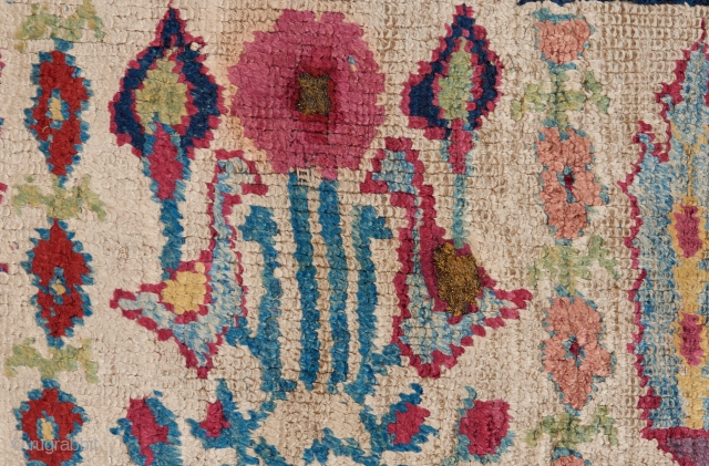 Detail of an important and early West Persian silk rug with metal thread highlights that is unparalleled in its beauty.             